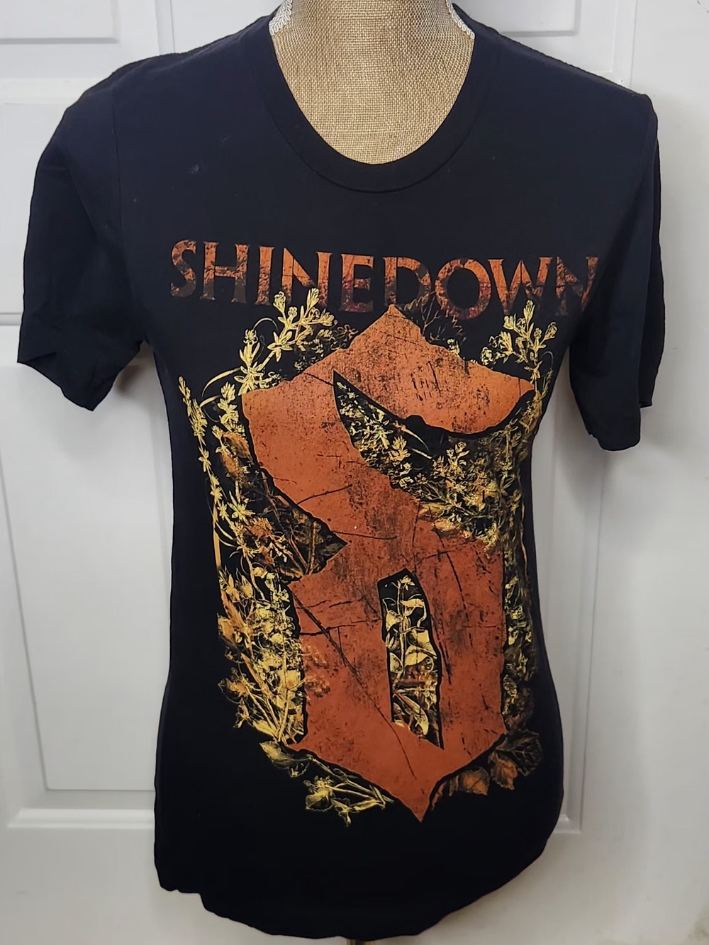 Bella Canvas Black Short Sleeve ShineDown Graphic Tee with Orange and Gold Print